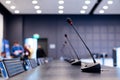 Close-up of microphones in an empty meeting room at a press conference. Royalty Free Stock Photo