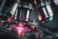 Close-up of microscope lens analyzing sample illuminated by red light, suggesting scientific research and discovery Royalty Free Stock Photo