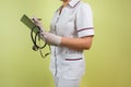 Close-up mid section of female doctor writing reports Royalty Free Stock Photo