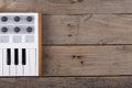 Close up of MIDI controller volume fader, knob and keys. Royalty Free Stock Photo