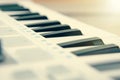 Close up of MIDI controller volume fader, knob and keys. Royalty Free Stock Photo