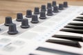 Close up of MIDI controller volume fader, knob and keys. Royalty Free Stock Photo