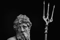 Close up the mighty god of sea and oceans Neptune Poseidon, Triton. Neptun`s trident as symbol strength, power and unrestraint.