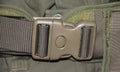 The close up of military green plastic belt buckle