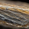 Close-up of a mineral\'s layered structure, likely mica. Features thin, parallel sheets Royalty Free Stock Photo