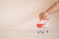 Close up the mini shopping cart at desk