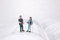 A close up of miniature people with social network Royalty Free Stock Photo