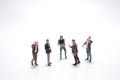 a close up of miniature people with social network diagram on open Royalty Free Stock Photo
