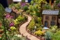 close-up of miniature village gardens and pathways