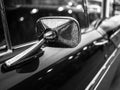 Close-up mirror sideview of classic car, have more dirty dust an