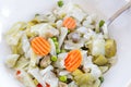 Close up of Mix of cooked vegetables on wooden table.