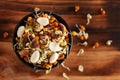 Close-up of A mix of organic sprout seeds sprouting  germinating in black ceramic bowl in the studio Royalty Free Stock Photo