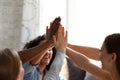 Close up diverse people giving high five. Royalty Free Stock Photo