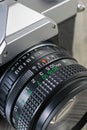 Close up of a 35mm analog camera manual focus lens Royalty Free Stock Photo