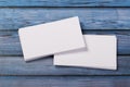 Close-up of two empty stacks of business cards on a blue-violet natural wooden background Royalty Free Stock Photo