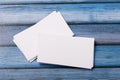 Close-up of two empty stacks of business cards on a blue-violet natural wooden background Royalty Free Stock Photo