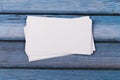 Close-up of two empty stacks of business cards on a blue-violet natural wooden background Royalty Free Stock Photo