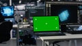 Close up of mockup laptop in server room where worker uses AI Royalty Free Stock Photo
