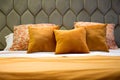 Close-up of a moddern bed with wool bedding and pillows Royalty Free Stock Photo