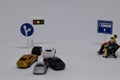 Close up model toy/miniature traffic jam and couple sitting for waiting a bus