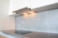 Close up on modern air exhauster kitchen fan or Range Hood. Stainless Steel Chimney Hood. Island Hoods. Royalty Free Stock Photo