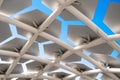 Close-up of a modern architectural structure featuring hexagonal panels arranged in a grid pattern Royalty Free Stock Photo