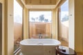 Close up modern bathroom area with bath tub inside in the morning at Abu Dhabi, UAE