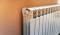 Close up of modern battery in room. White heating radiator indoor