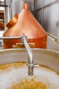 Close up of modern beer plant brewery , with brewing kettles, vessels, tubs and pipes made of stainless steel, in a beer Royalty Free Stock Photo