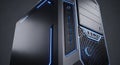 A close-up of a modern black desktop computer tower with a sleek design, blue LED lighting, multiple front ports, and a power Royalty Free Stock Photo