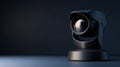 Close-up of a modern black security camera with lens reflection on a dark background, highlighting surveillance technology and Royalty Free Stock Photo