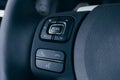 Audio control buttons on the steering wheel of a modern car Royalty Free Stock Photo