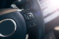 Audio control buttons on the steering wheel of a modern car Royalty Free Stock Photo