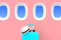 Close up modern blue suitcases bag with sun glasses, hat and airplane window on pink background. Travel concept. Vacation trip. Royalty Free Stock Photo