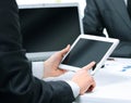 Close-up of a modern business team using tablet computer the work Royalty Free Stock Photo