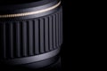 Close up of Modern Camera Lens Captured Against Black Background