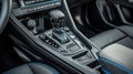 Close-up of modern car\'s center console with gear stick, buttons, and controls Royalty Free Stock Photo