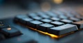 Close-up of a modern computer keyboard with illuminated backlit keys in a low light environment showing detailed texture and depth Royalty Free Stock Photo