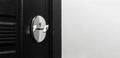 Close-up of modern door lock with key inside. Panoramic photo with copy space. Royalty Free Stock Photo