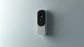 A Close-up of a Modern Doorbell Camera Mounted on a Wall Royalty Free Stock Photo
