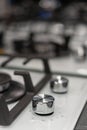 Close-up of modern gas stove flame control knobs. Royalty Free Stock Photo