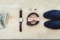 Close up of modern man accessories. Biege bowtie, leather shoes, belt, watch, cufflinks, money and wedding rings. Royalty Free Stock Photo