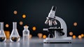 Closeup of a modern microscope on a laboratory table with glass flasks Royalty Free Stock Photo