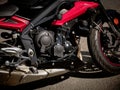 Close-up of a modern motorcycle engine with frame and exhaust system tuning Royalty Free Stock Photo