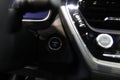 Close up of modern new car start,stop engine button. Royalty Free Stock Photo