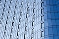 Close-up of a modern office building with glass windows Royalty Free Stock Photo