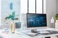 Close up of modern office desktop with items, computer and forex chart. Royalty Free Stock Photo