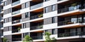 Close up of a modern residential building facade sleek design, clean lines, and advanced materials, creating a