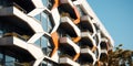 Close up of a modern residential building facade sleek design, clean lines, and advanced materials, creating a