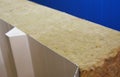 A close-up of a modern roofing insulation building material, roofing sandwich panel with a mineral wool core, fireproof mineral